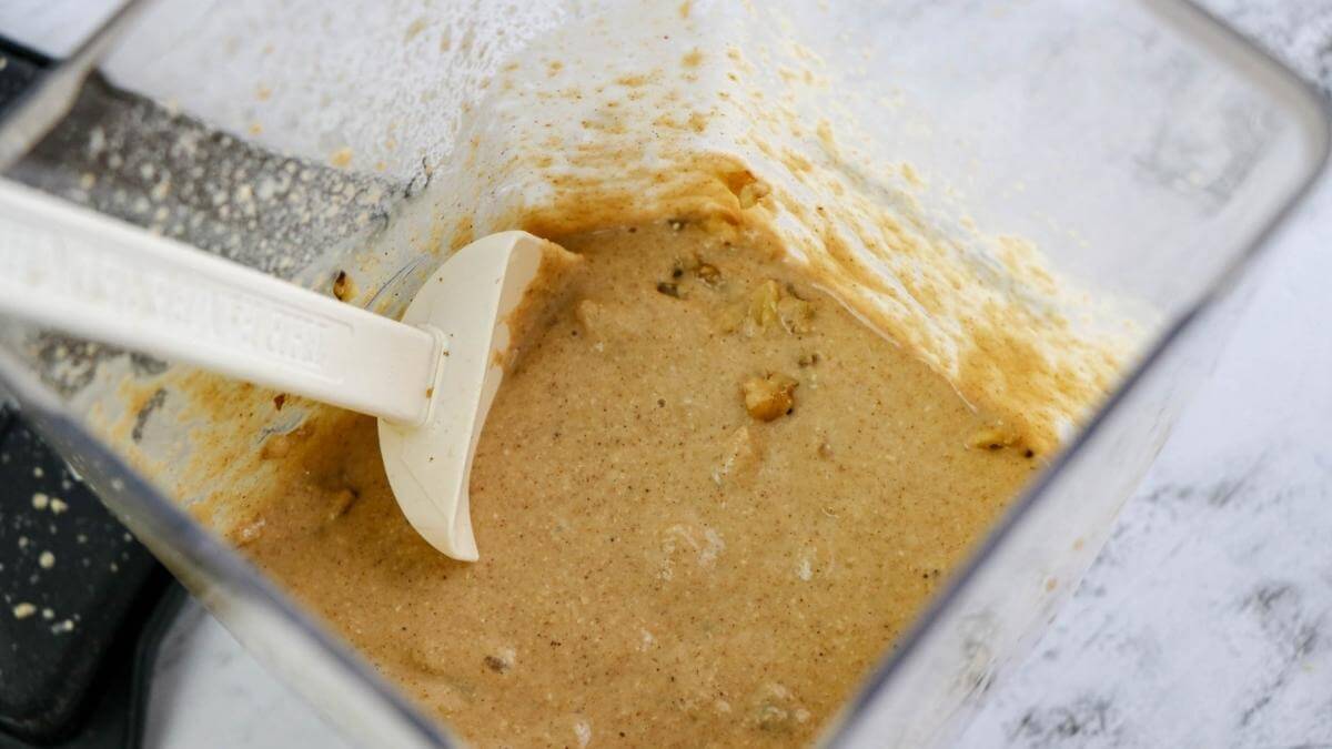 Batter for making banana oat muffins in a blender.